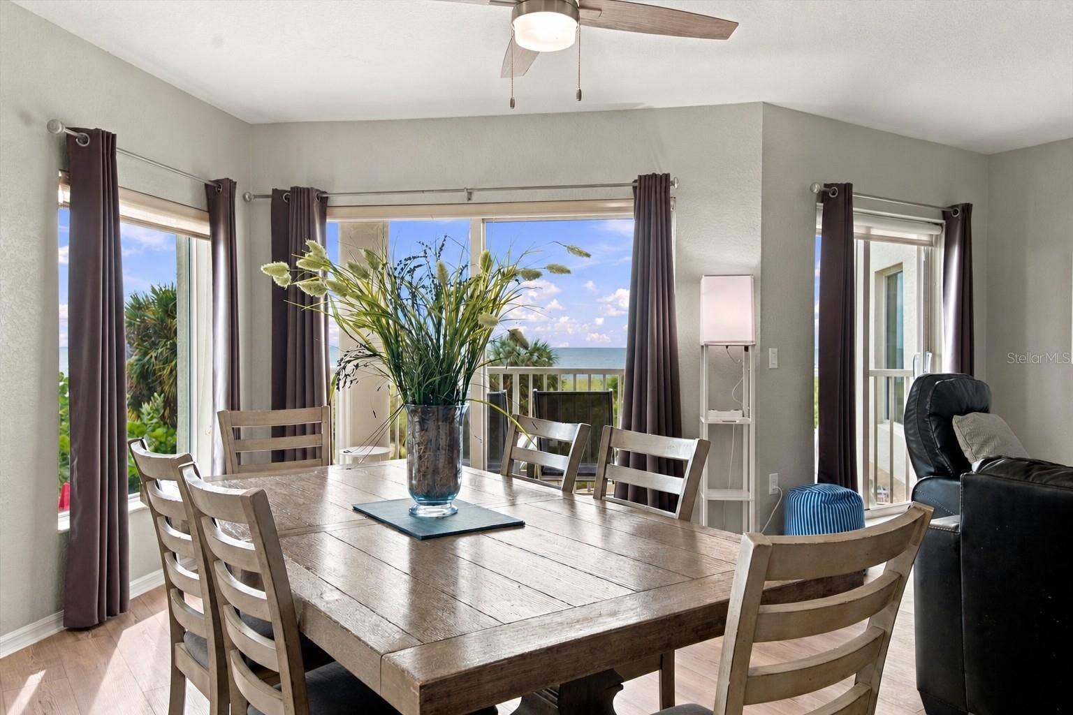 12000 GULF BOULEVARD, #206W-205W, Treasure Island, FL 33706 Generous Dining Area with Ample Seating and Gulf of Mexico Views in the Background