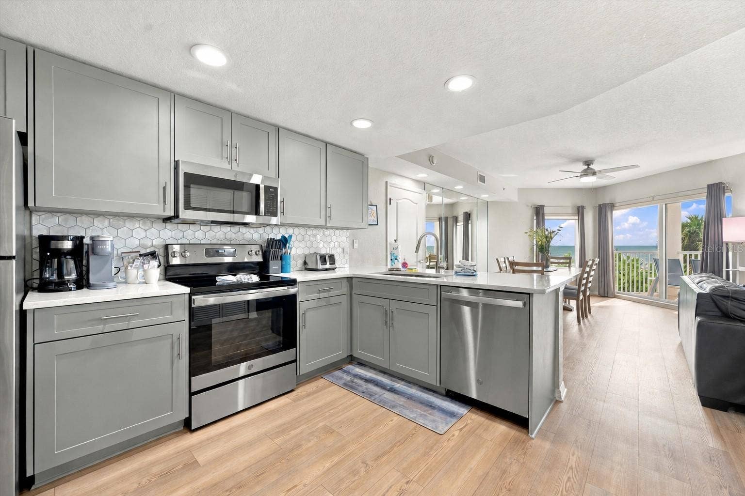12000 GULF BOULEVARD, #206W-205W, Treasure Island, FL 33706 Updated Kitchen with Quartz Countertops, Stylish Backsplash, LVP Flooring and Gulf Views