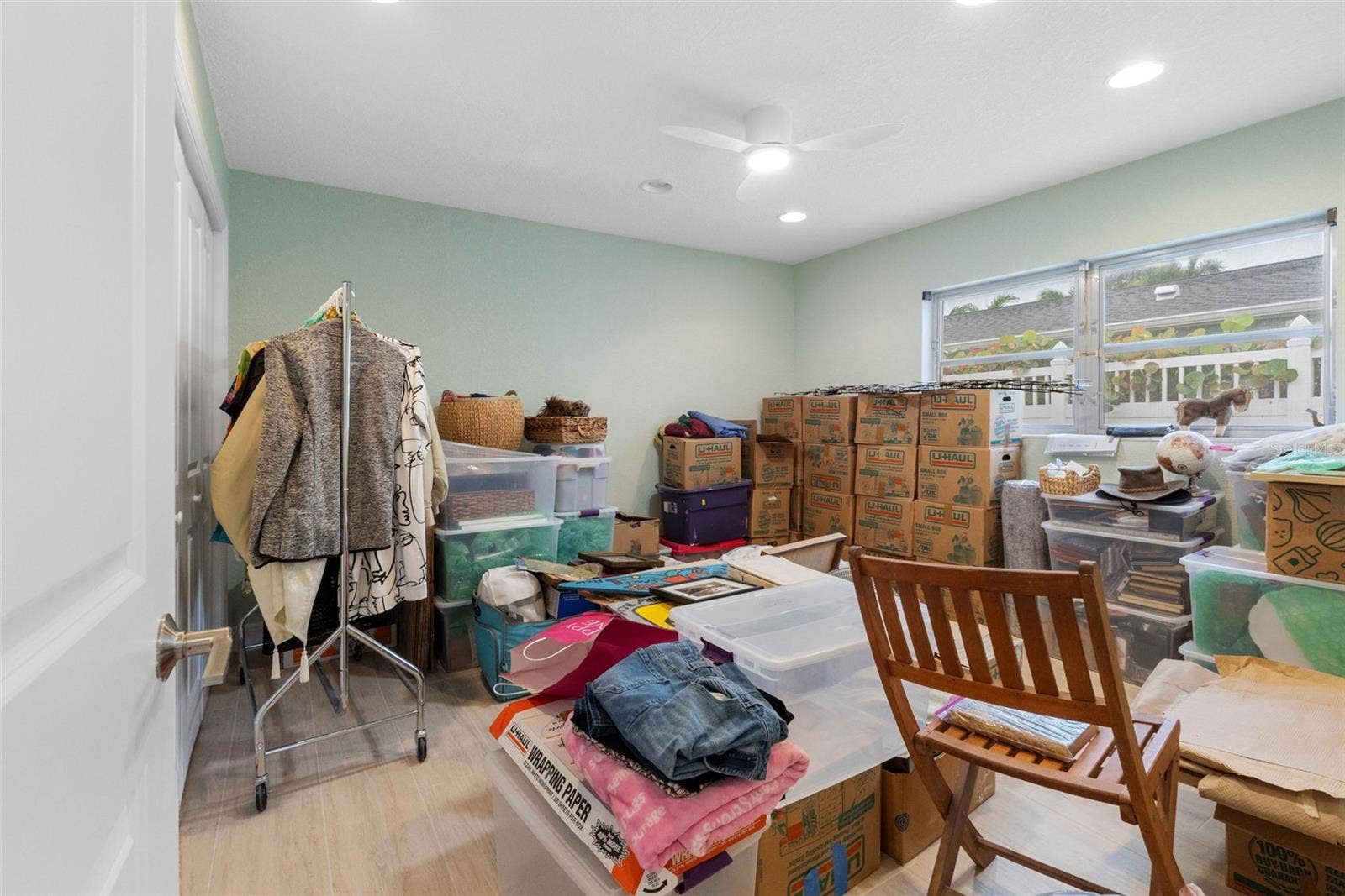 11280 5TH STREET E, Treasure Island, FL 33706 Bedroom Three currently used for storage. Will be emptied.