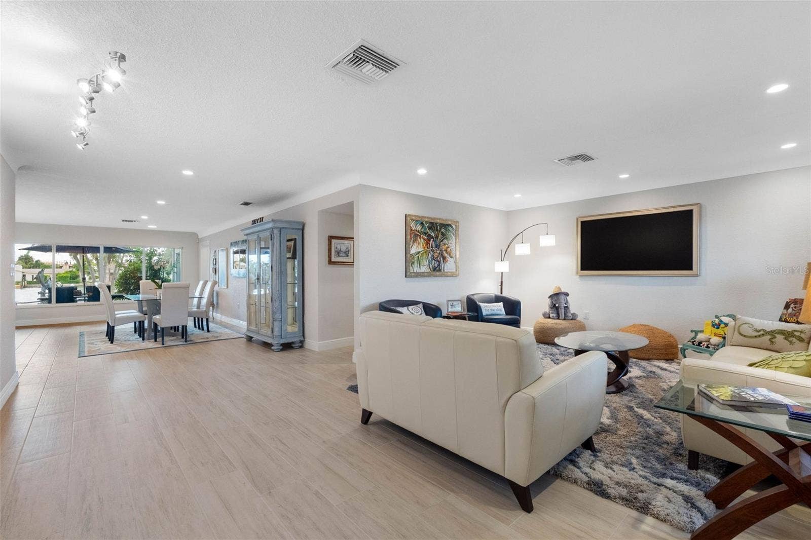 11280 5TH STREET E, Treasure Island, FL 33706 Open to dining area with pool views.