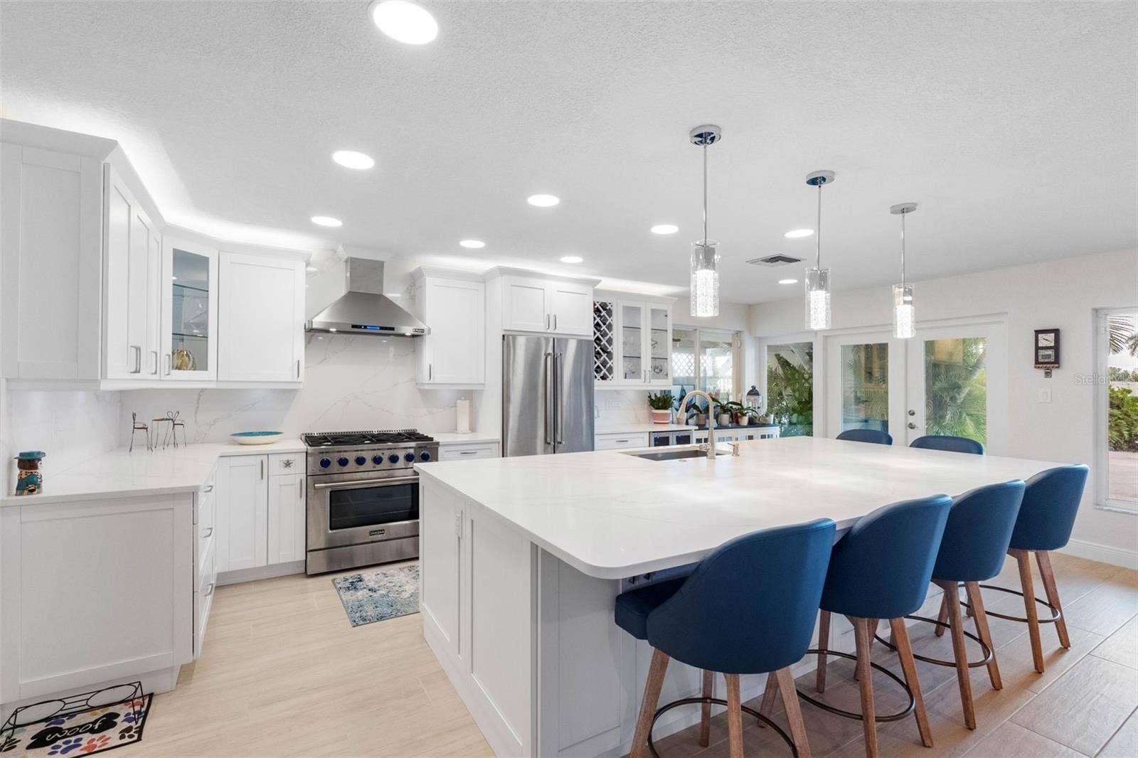 11280 5TH STREET E, Treasure Island, FL 33706 New modern kitchen with 6-burner stove with convention oven.