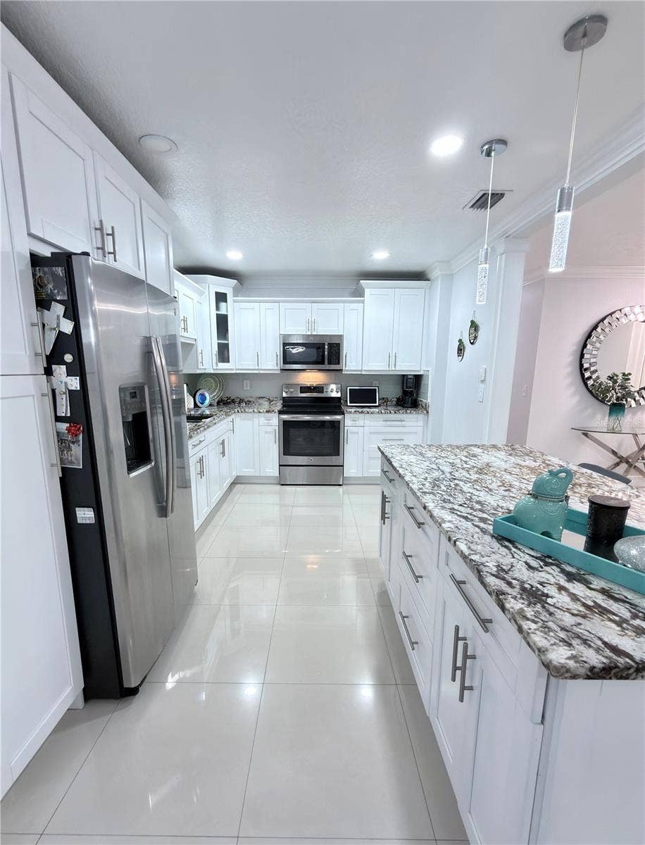 7518 BLOSSOM AVENUE, Tampa, FL 33614 7518 BLOSSOM AVENUE, Tampa, FL 33614