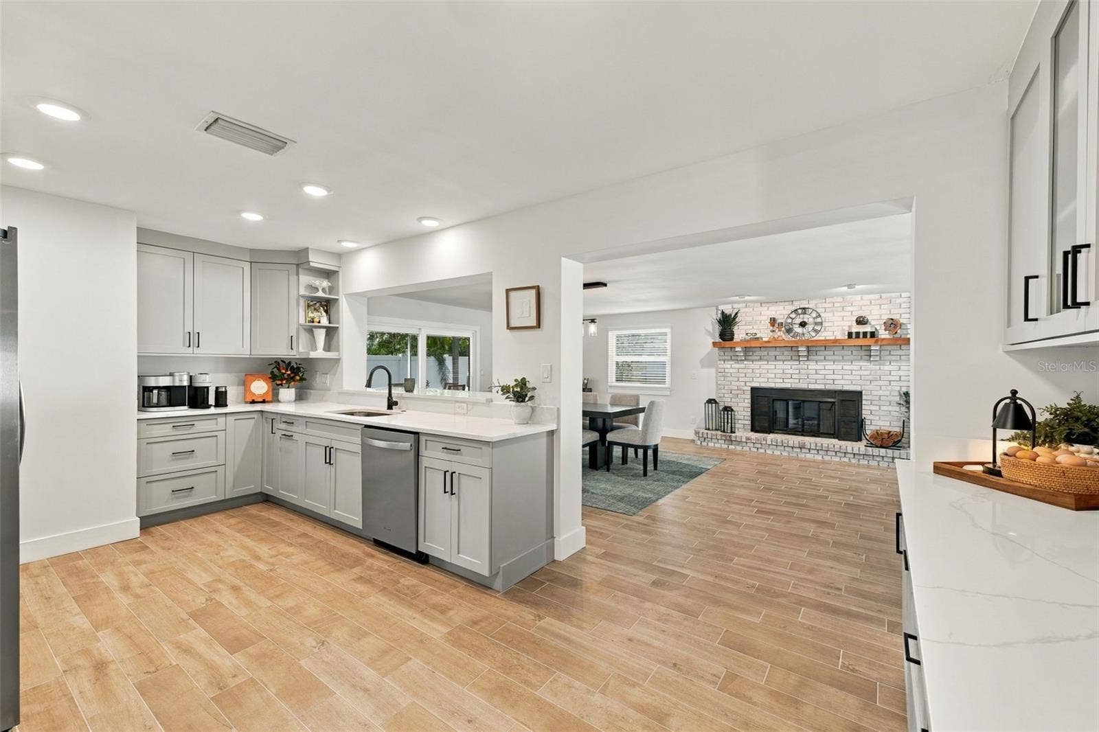 Kitchen w/ View of Family + Dining Room ,