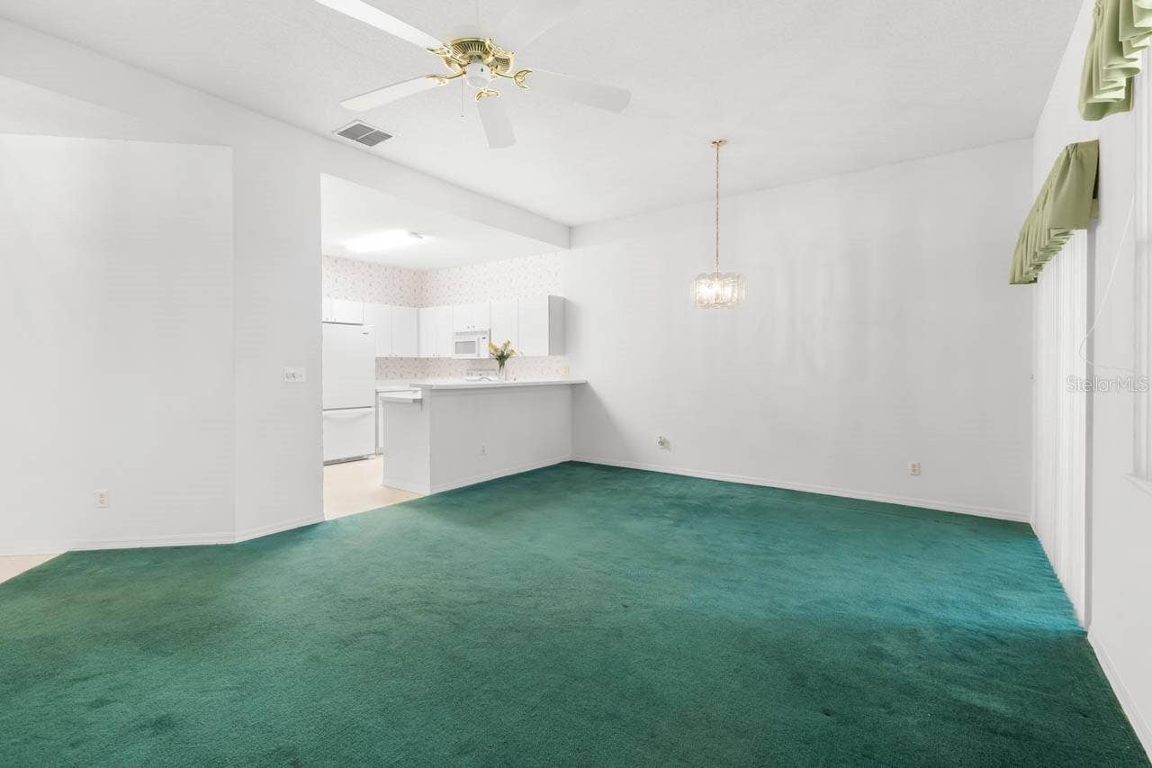 2617 NEWCOMB COURT, Sun City Center, FL 33573 Great room and kitchen