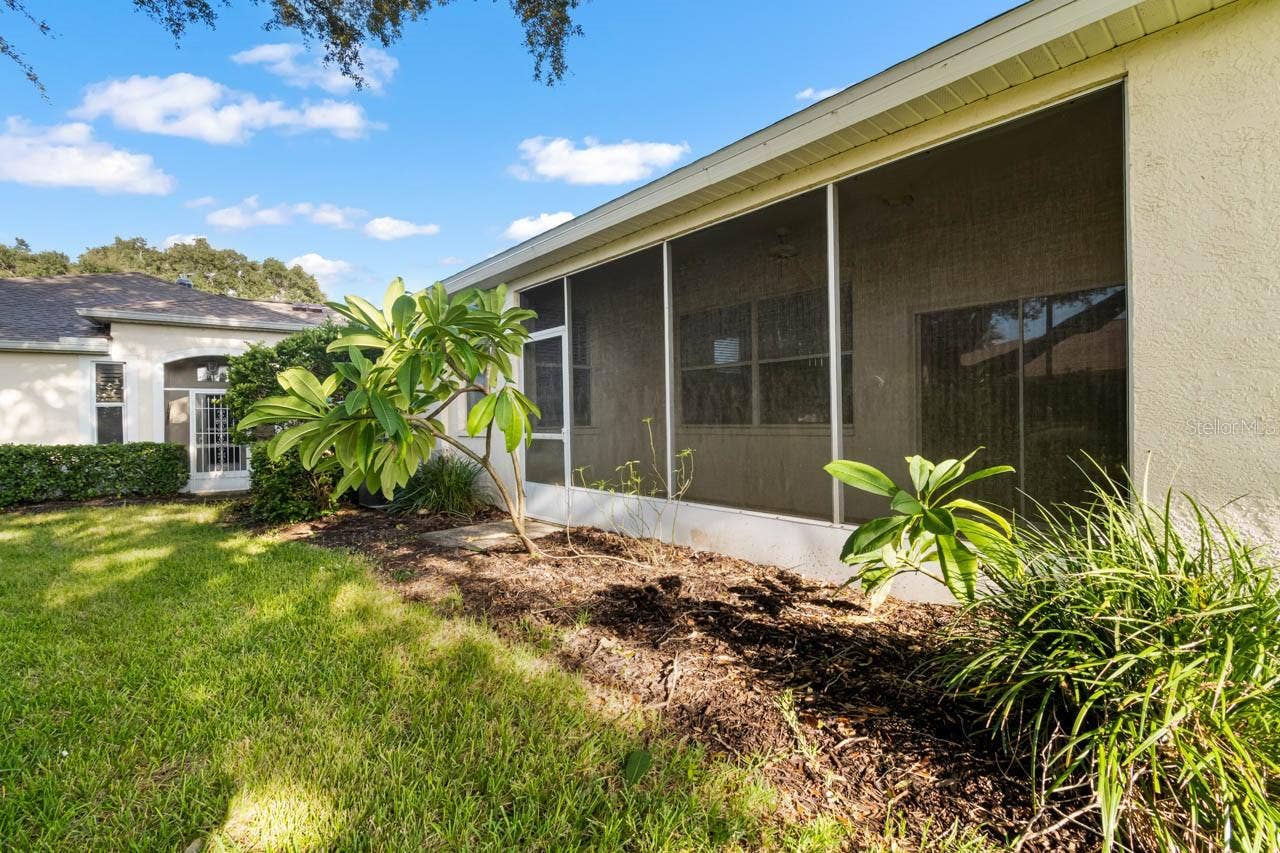 2617 NEWCOMB COURT, Sun City Center, FL 33573 Rear of home facing the screened lanai