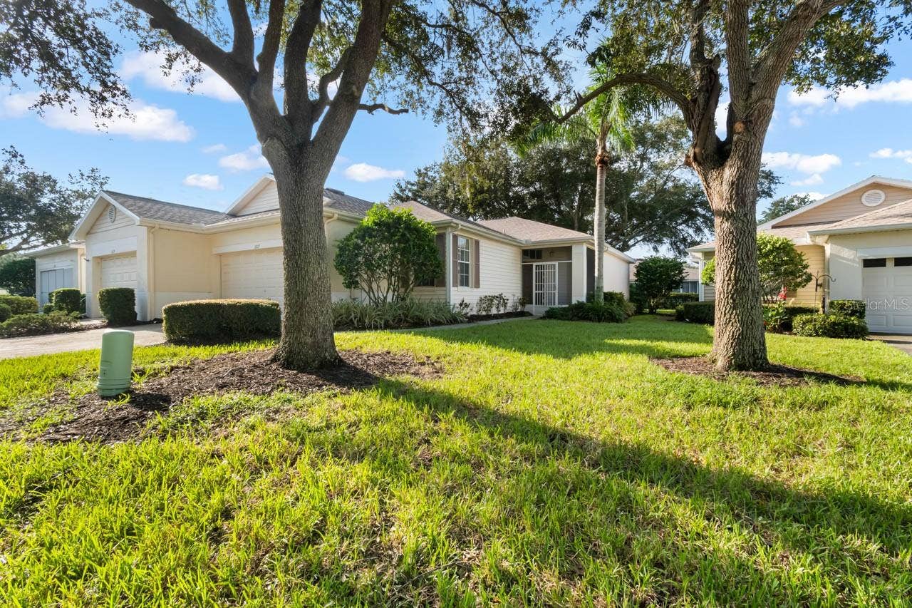 2617 NEWCOMB COURT, Sun City Center, FL 33573 Front corner view of home