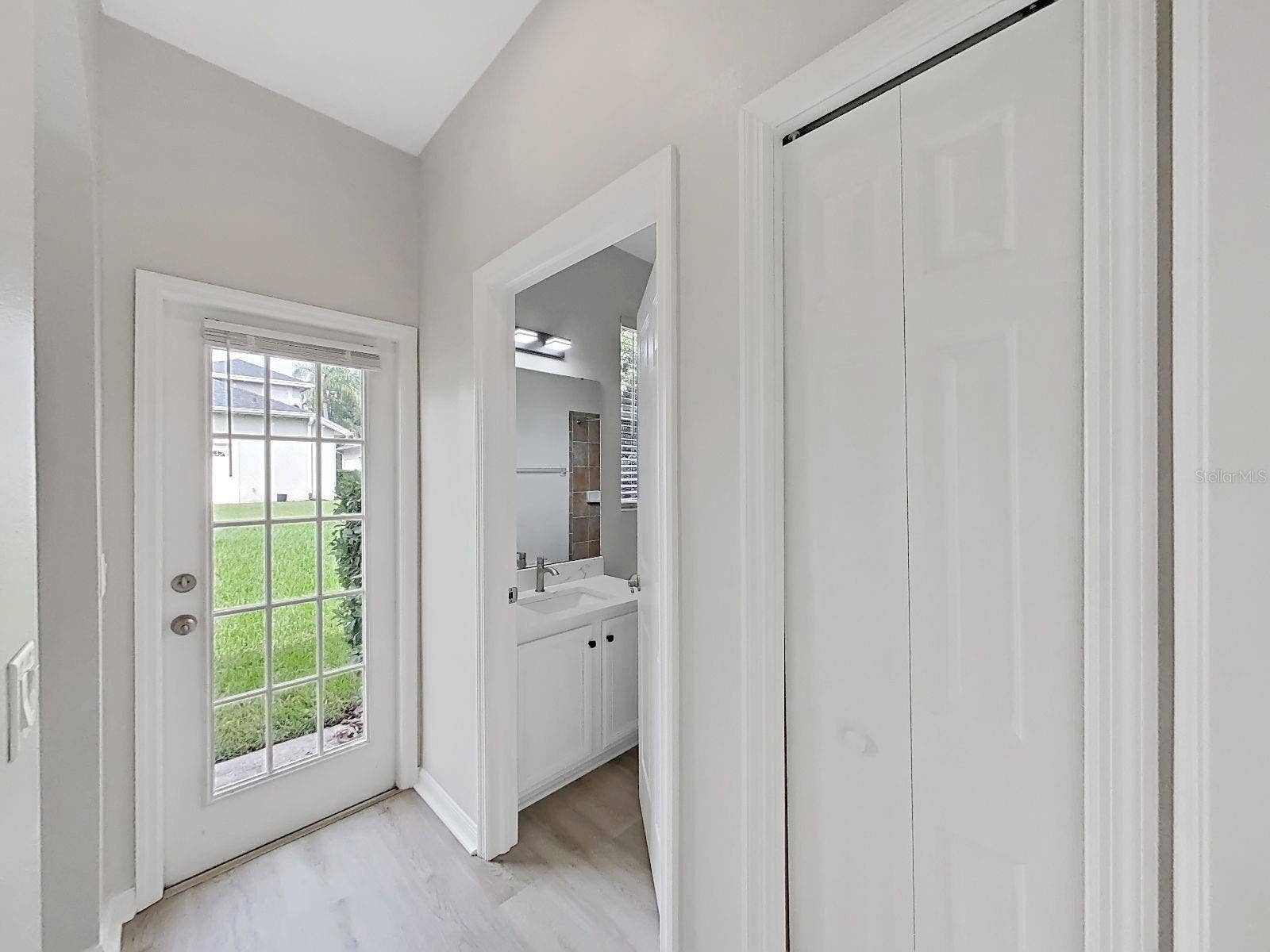 9310 MANGROVE COURT, Tampa, FL 33647 back door to yard