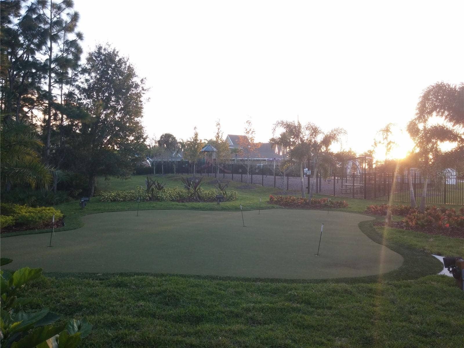 9310 MANGROVE COURT, Tampa, FL 33647 golf padding