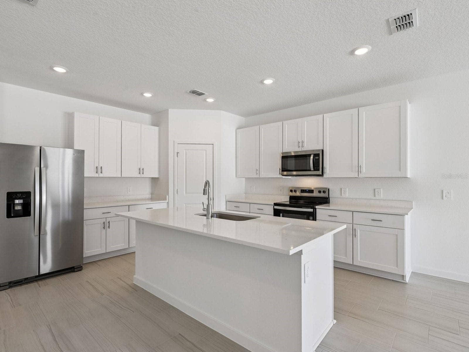 33 GARNI DRIVE, Palm Coast, FL 32137 Photo is not of the actual home, but is an inspirational photo of builders model home and may depict options, furnishings, and/or decorator features that are not included.