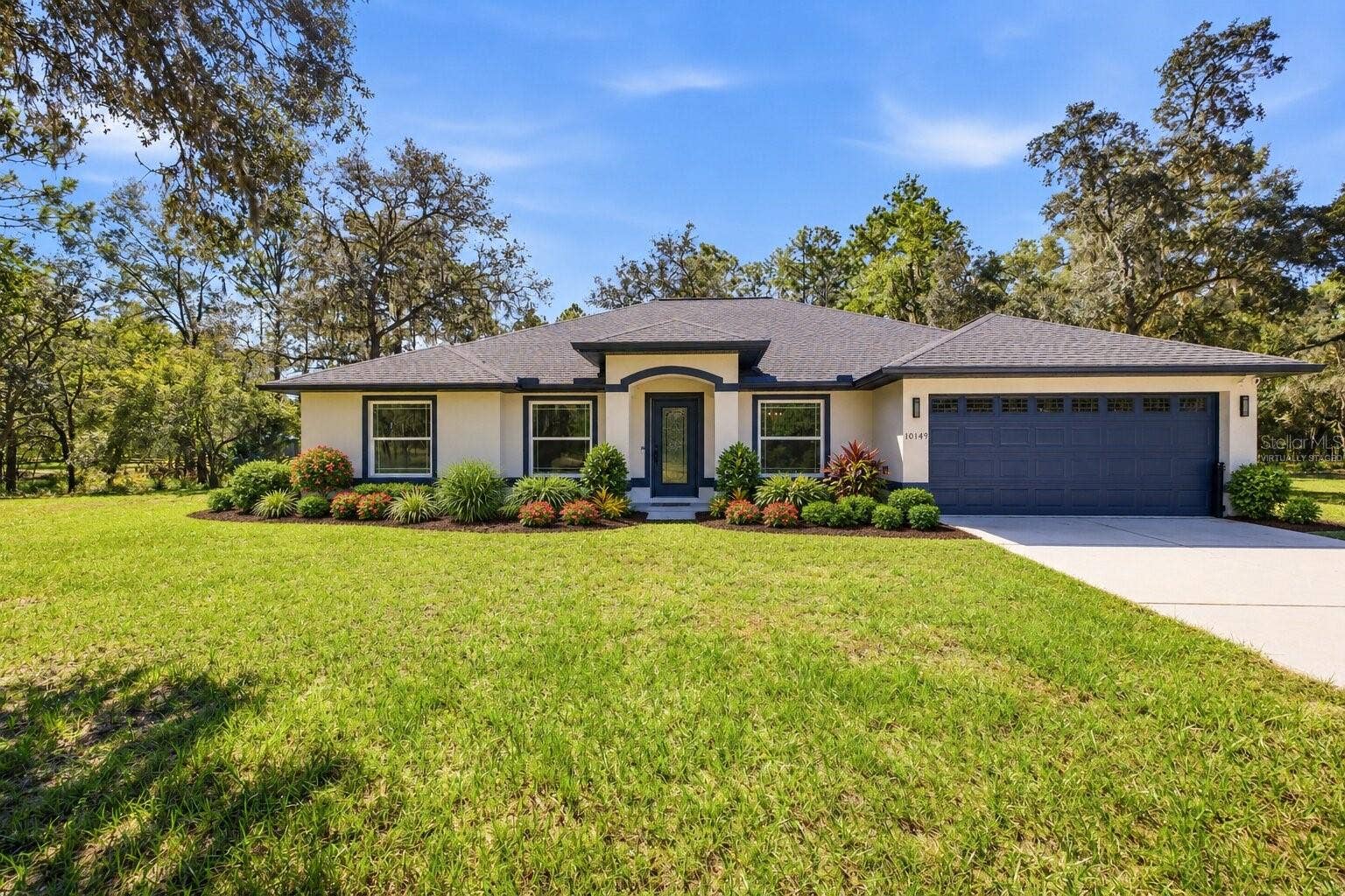 10149 ROCKBAY ROAD, Brooksville, FL 34601 Virtually staged landscaping