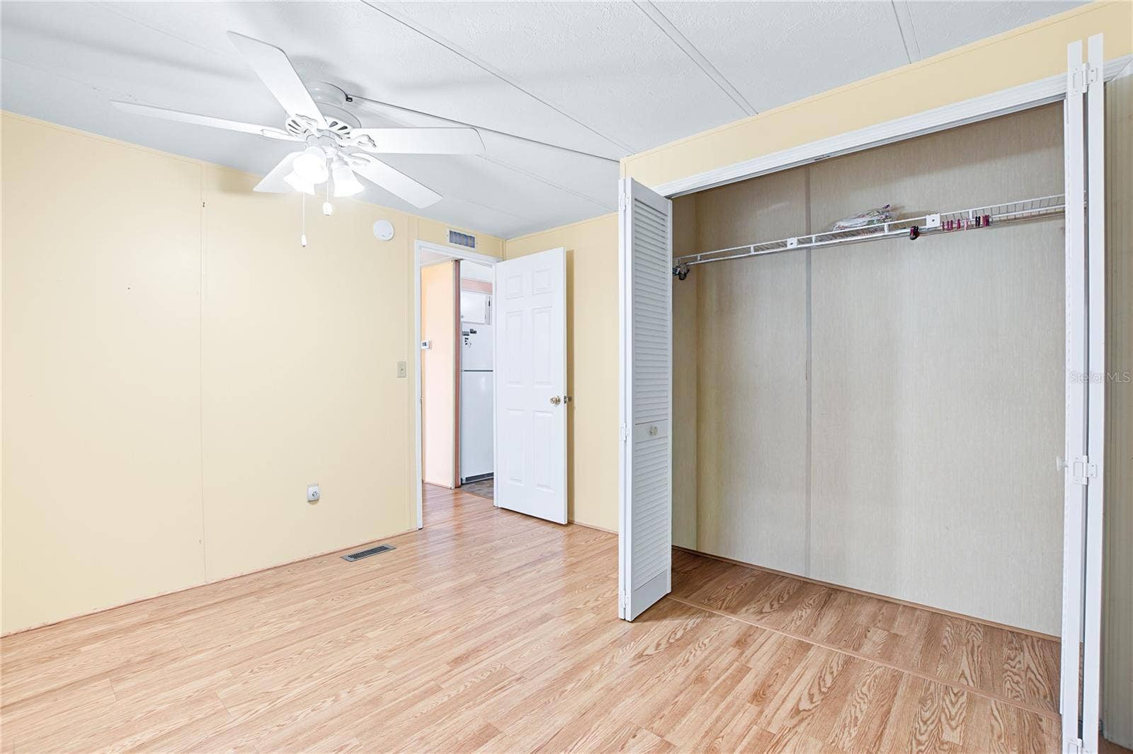 5716 PAWNEE STREET, Zephyrhills, FL 33542 spacious closet in guest room