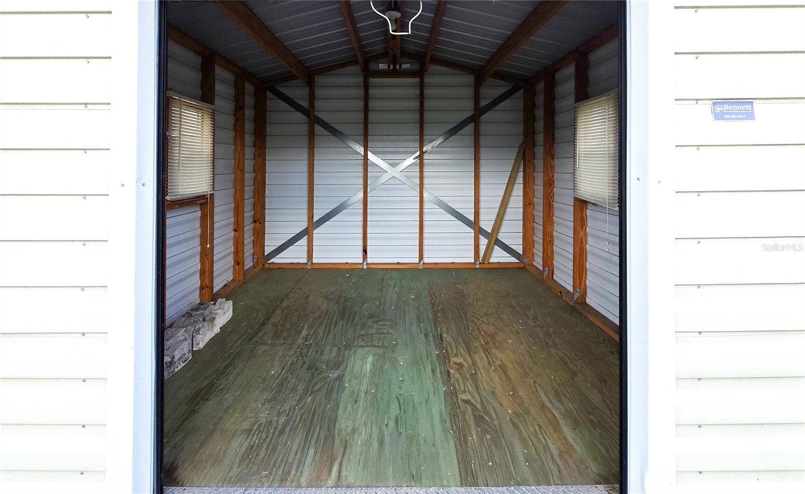 5716 PAWNEE STREET, Zephyrhills, FL 33542 inside the 10x10 shed