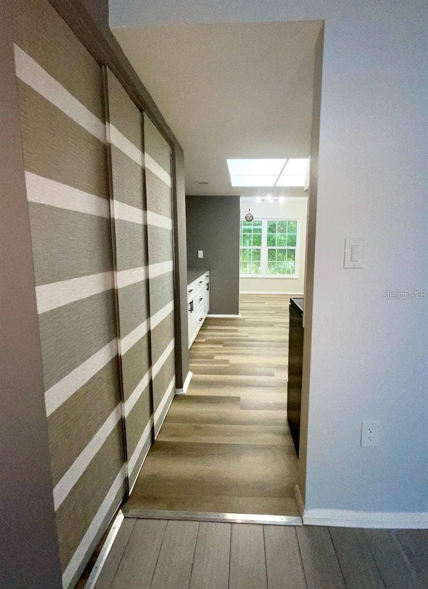 Pantry closet and doorway to kitchen from dining area