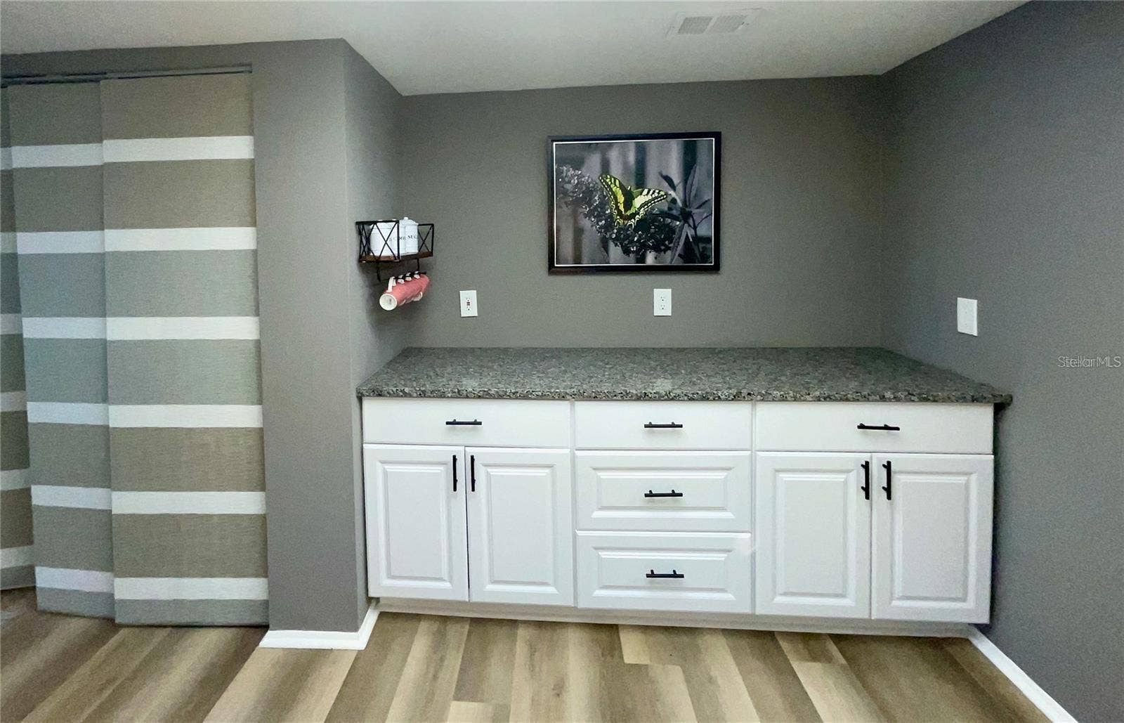 Kitchen pantry closet and coffee bar with extra cabinets
