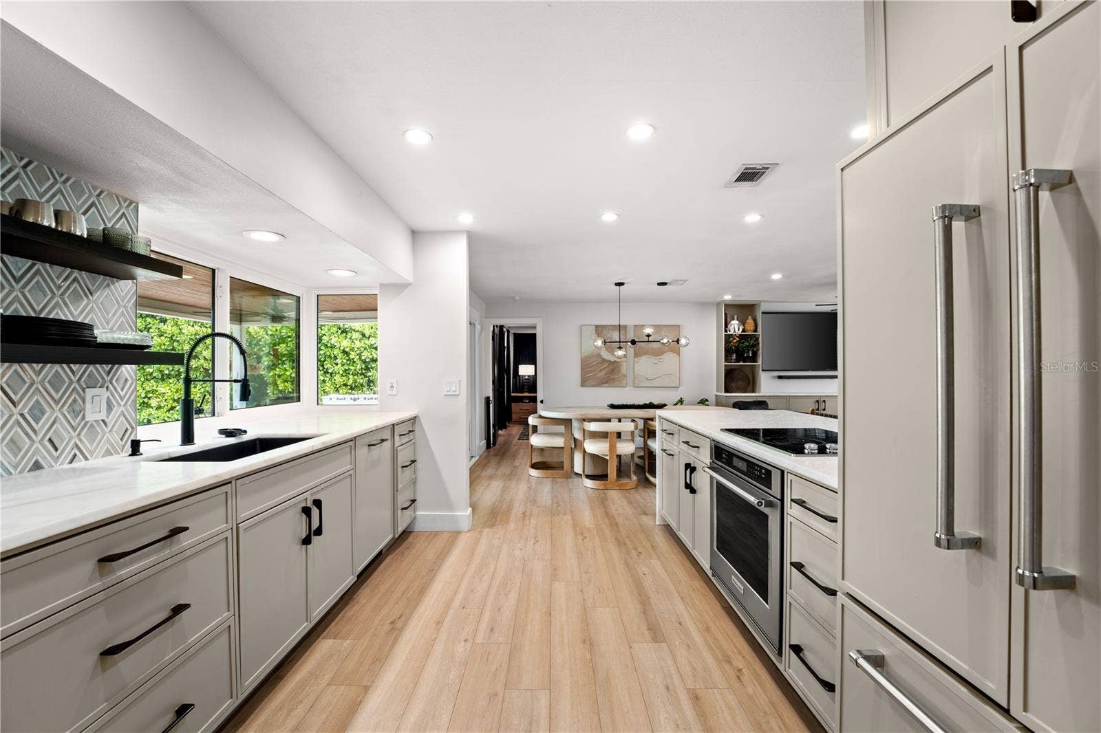 Spacious Kitchen Area w/ Views of Outdoor Entertainment Space