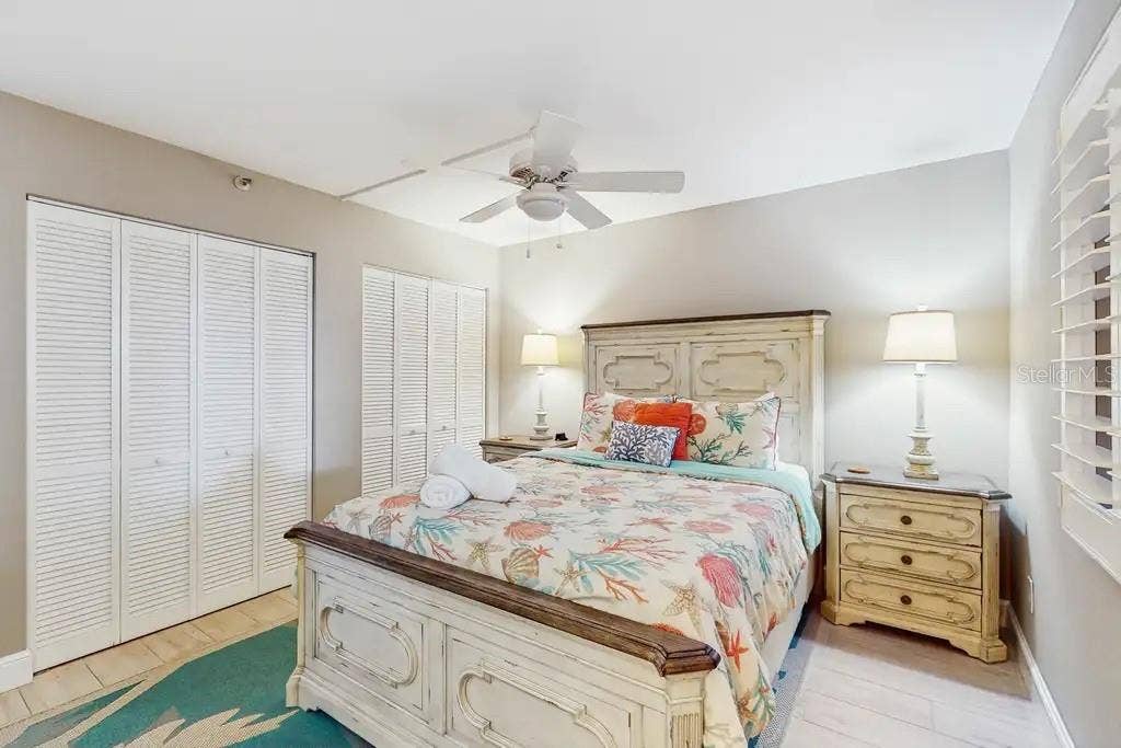 18400 GULF BOULEVARD, #1208, Indian Shores, FL 33785 THIRD BEDROOM FEATURES DOUBLE CLOSETS, QUEEN SIZE BED, PLANTATION SHUTTERS, FLAT TV, AND CEILING FAN