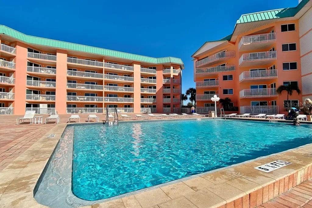 18400 GULF BOULEVARD, #1208, Indian Shores, FL 33785 HEATED POOL ON THE SECOND FLOOR POOL DECK, ONE OF THE MANY UNIQUE AMENITIES OF THIS MID RISE COMMUNITY.