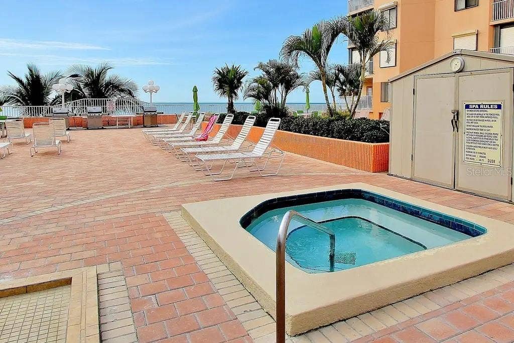 18400 GULF BOULEVARD, #1208, Indian Shores, FL 33785 A HEATED SPA FOR ADDITIONAL RELAXATION DURING THE DAY, OR UNDER THE STARS.
