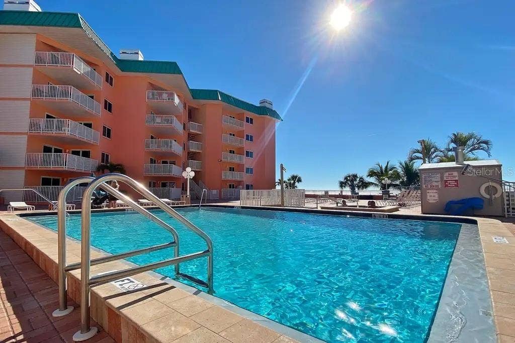 18400 GULF BOULEVARD, #1208, Indian Shores, FL 33785 UNOBSTRUCTED VIEWS OF THE BEACH FROM THE SECOND FLOOR POOL DECK.
