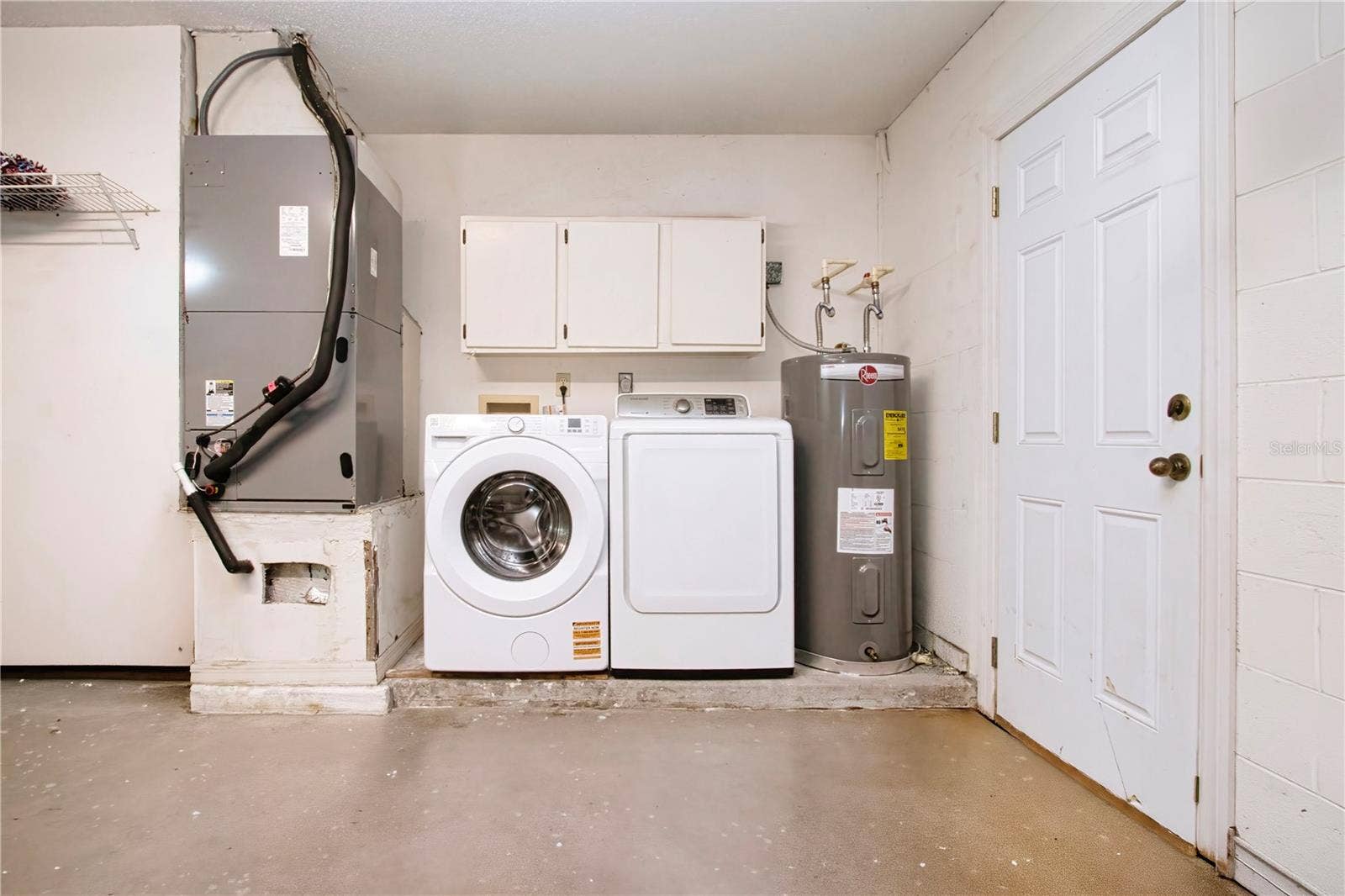 2035 PRESTANCIA LANE, Sun City Center, FL 33573 Garage/Laundry