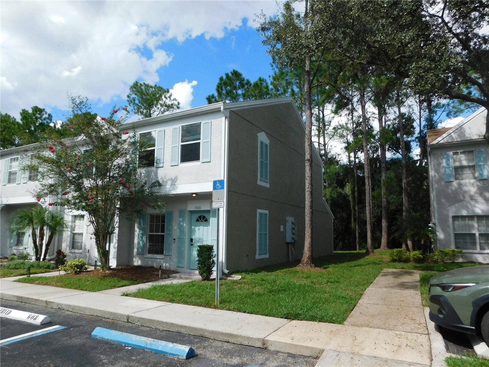 8660 HUNTERS KEY CIRCLE, Tampa, FL 33647 Corner Unit with reserved parking space in front.