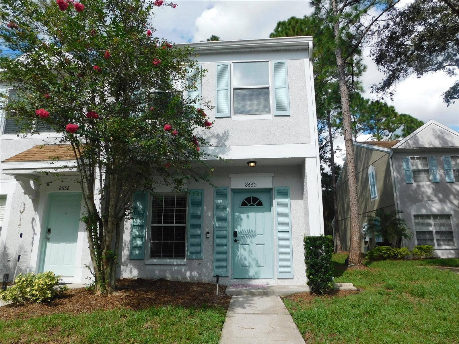 8660 HUNTERS KEY CIRCLE, Tampa, FL 33647 Corner Unit with reserved parking space in front.