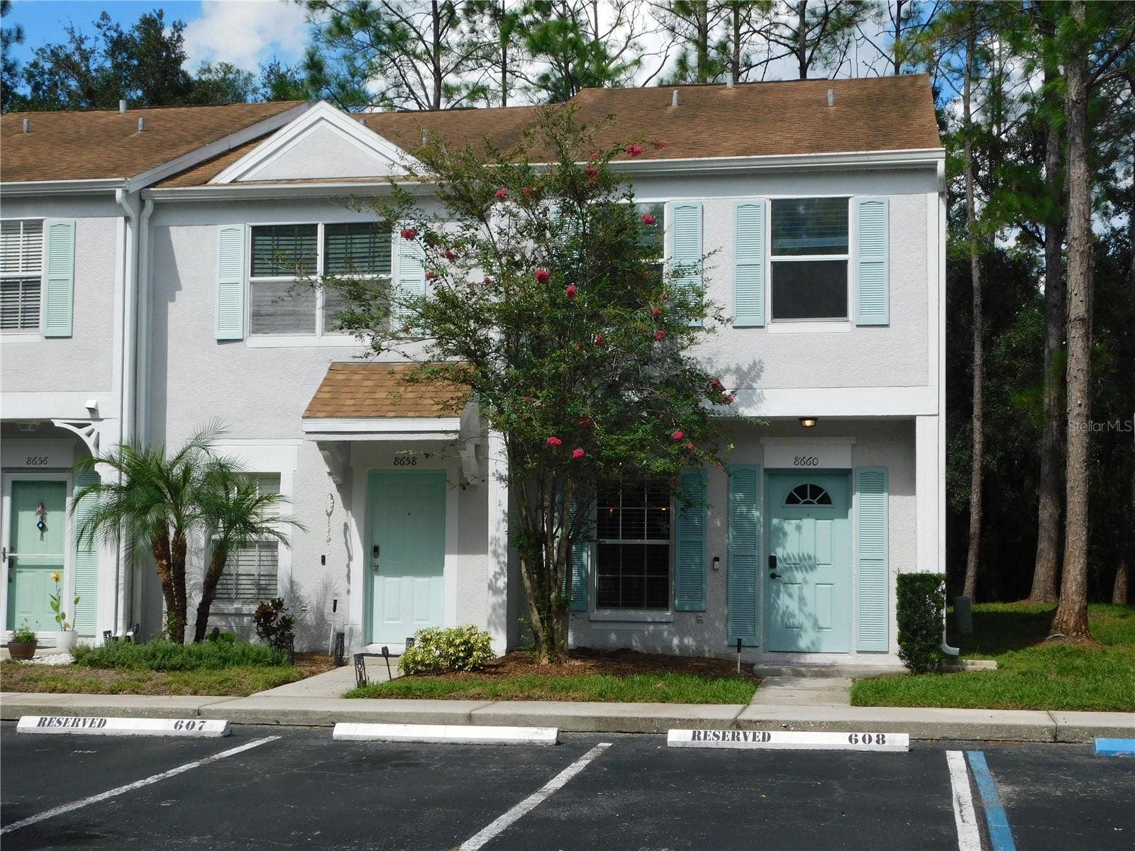 8660 HUNTERS KEY CIRCLE, Tampa, FL 33647 Corner Unit with reserved parking space in front.
