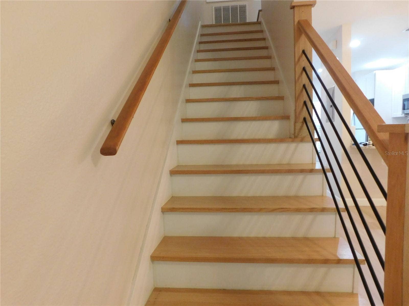 8660 HUNTERS KEY CIRCLE, Tampa, FL 33647 Remodeled wood stairs