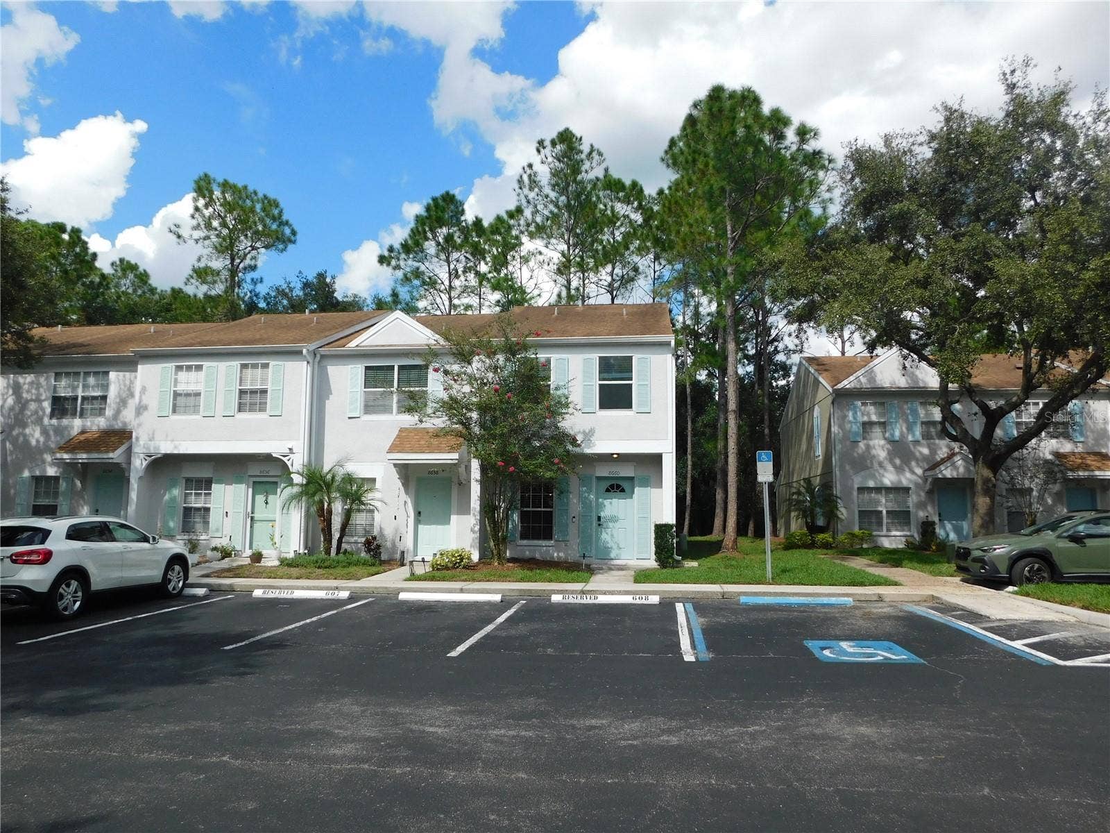 8660 HUNTERS KEY CIRCLE, Tampa, FL 33647 Corner Unit with reserved parking space in front.