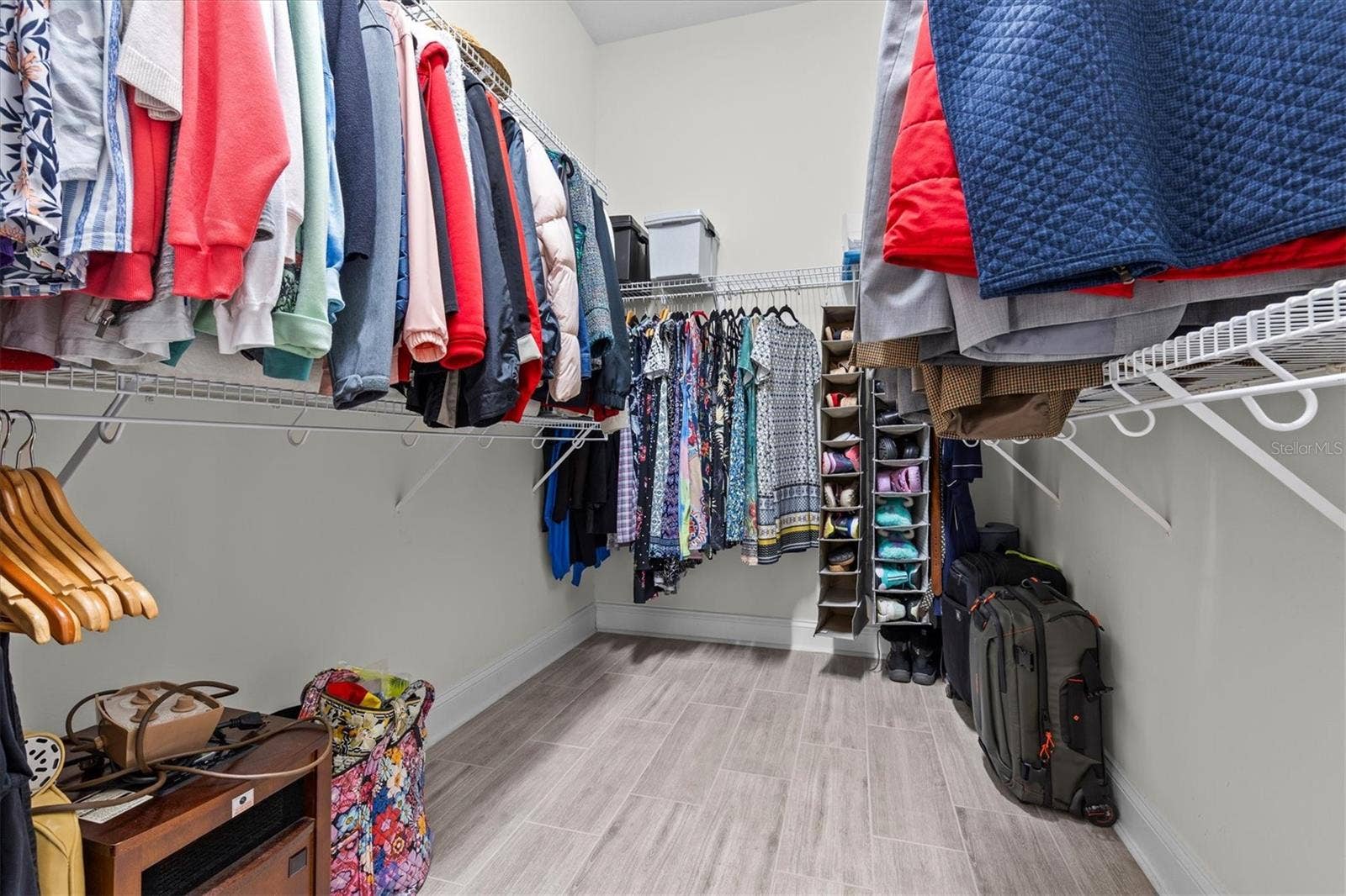 480 GILMAN PLACE N, St Petersburg, FL 33716 One of two large walk-in closets in Owner's suite.