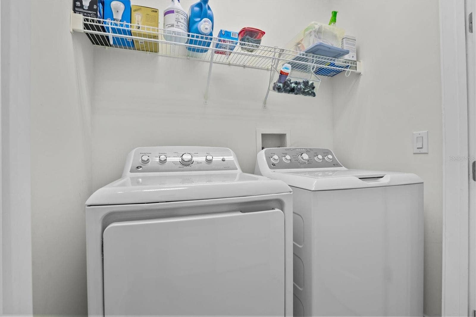 480 GILMAN PLACE N, St Petersburg, FL 33716 laundry room adjacent to kitchen and owner'ss suite.