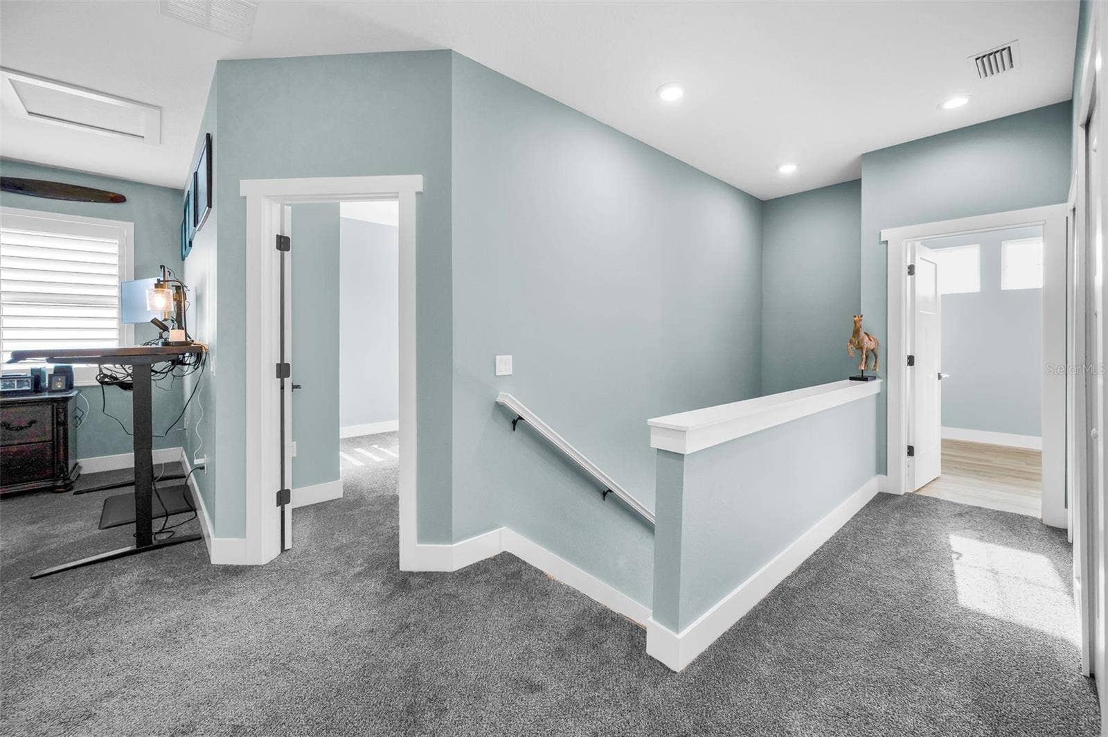 Upstairs loft could be media or exercise