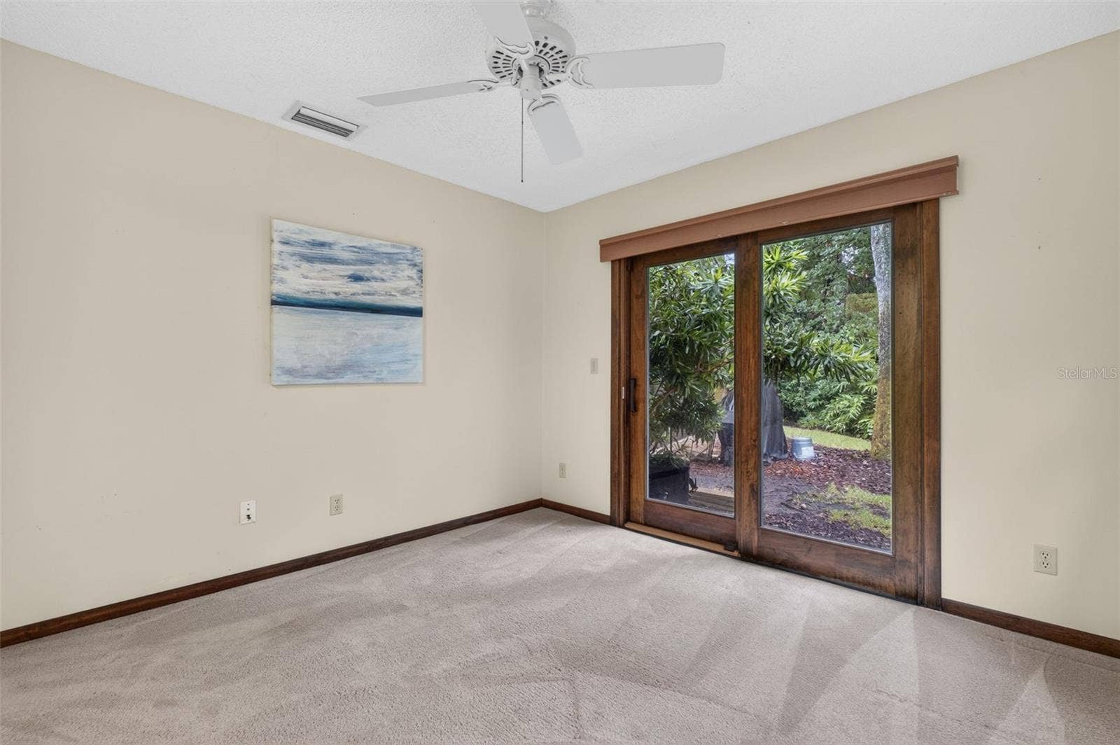 2nd Bedroom/Office with doors to yard