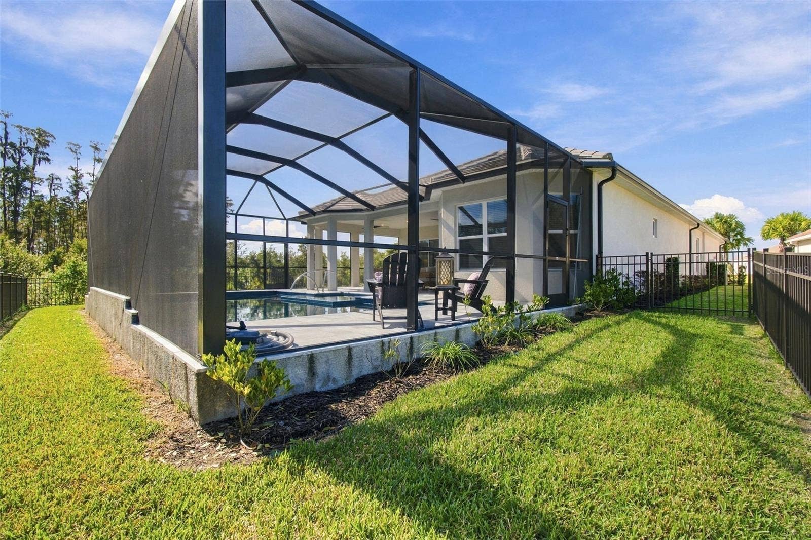 29749 CASSINO COURT, Wesley Chapel, FL 33543 Notice the fenced yard. Perfect for pets.