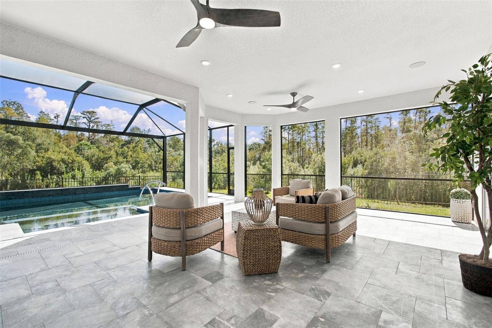 29749 CASSINO COURT, Wesley Chapel, FL 33543 Just under 500 square foot tiled lanai