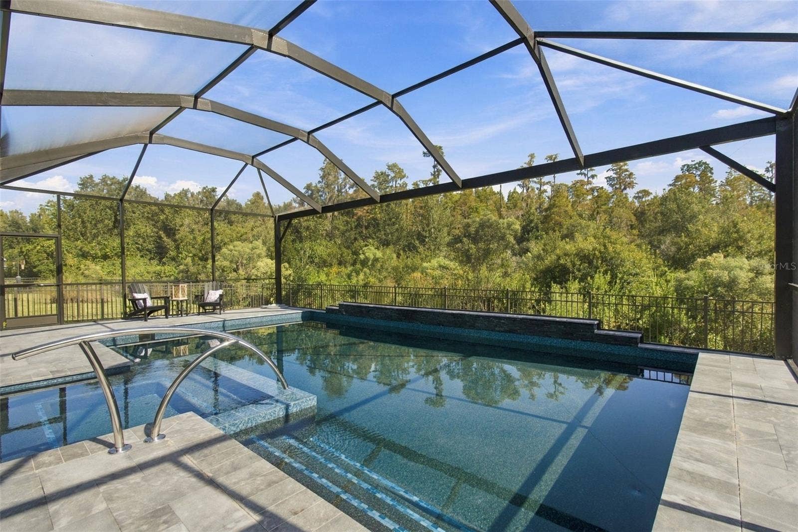 29749 CASSINO COURT, Wesley Chapel, FL 33543 Luxury Pool and Spa. Notice the panoramic screen