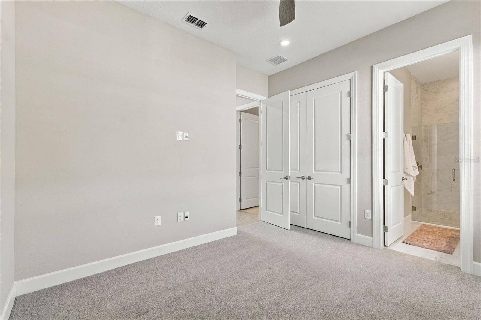 29749 CASSINO COURT, Wesley Chapel, FL 33543 Bedroom Two features an ensuite bathroom