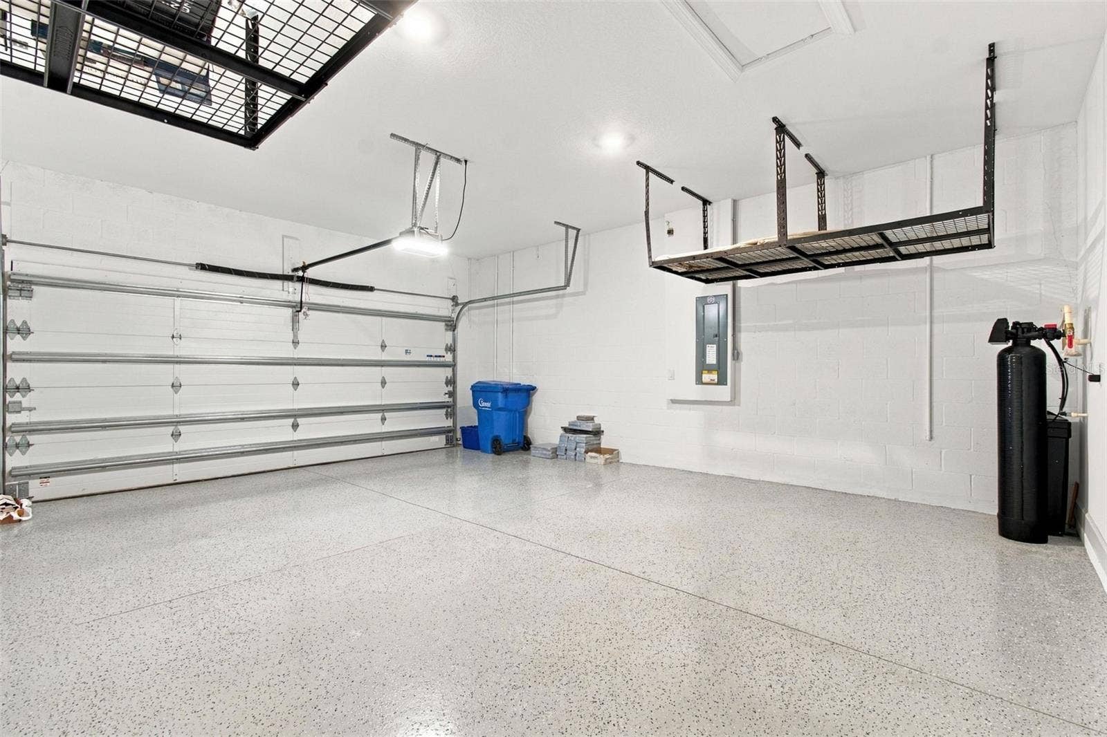 29749 CASSINO COURT, Wesley Chapel, FL 33543 The garage has the four foot extension option, epoxied floors and built-in storage racks