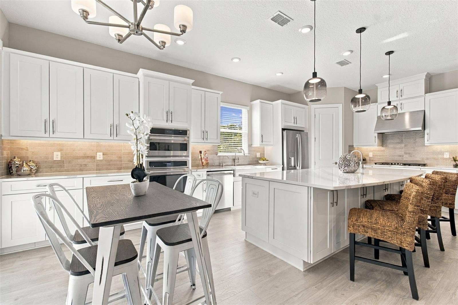 29749 CASSINO COURT, Wesley Chapel, FL 33543 Upgraded kitchen with extended cabinetry provides great storage