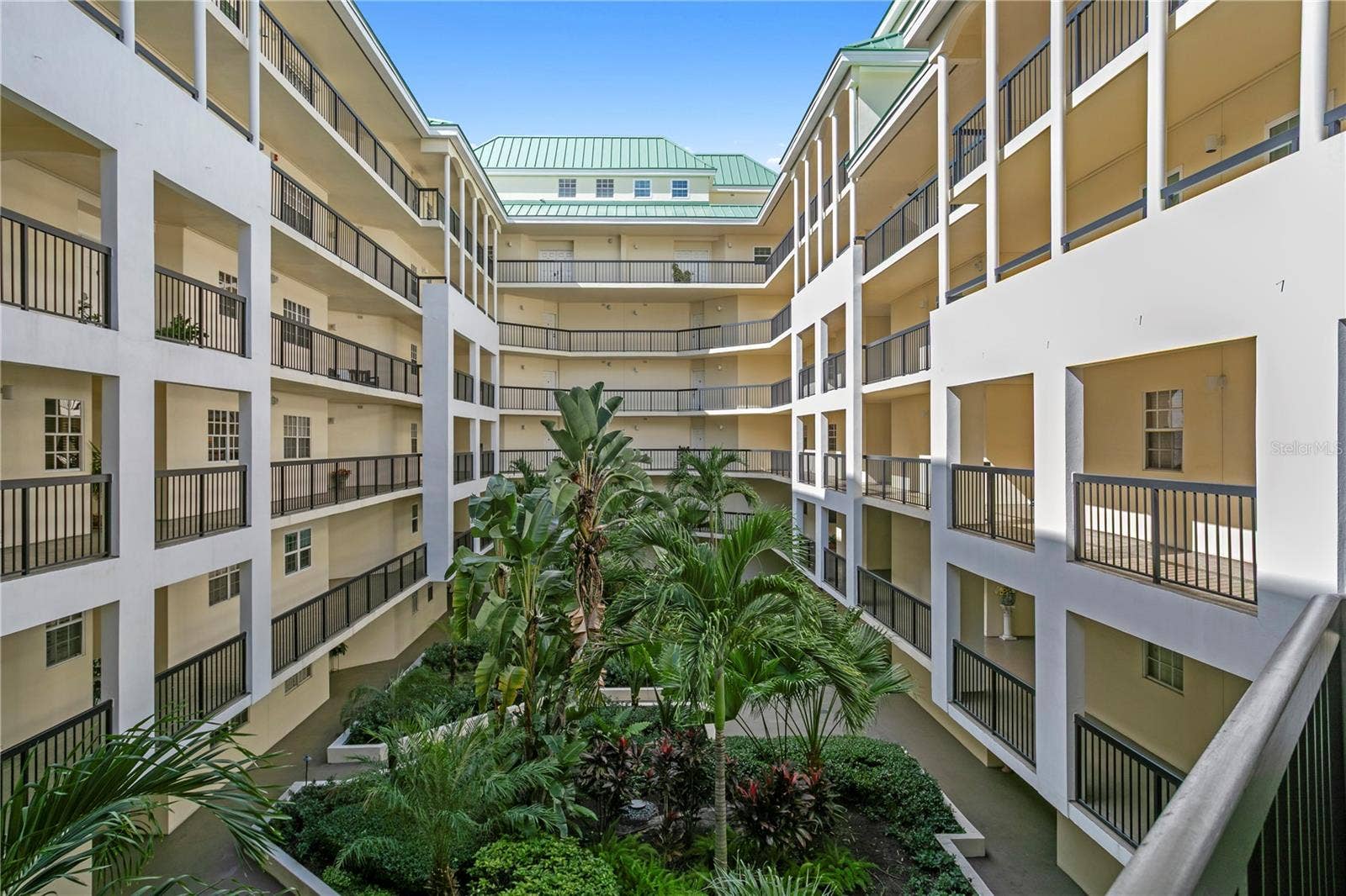1000 S HARBOUR ISLAND BOULEVARD, #2306, Tampa, FL 33602 Lush, well-maintained courtyard landscaping creates a serene retreat within the condominium grounds