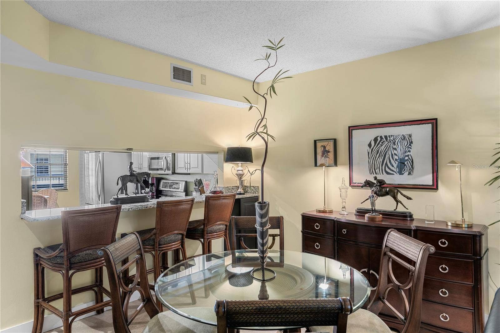 1000 S HARBOUR ISLAND BOULEVARD, #2306, Tampa, FL 33602 Kitchen flows effortlessly into bar seating and a dining area for a connected living experience