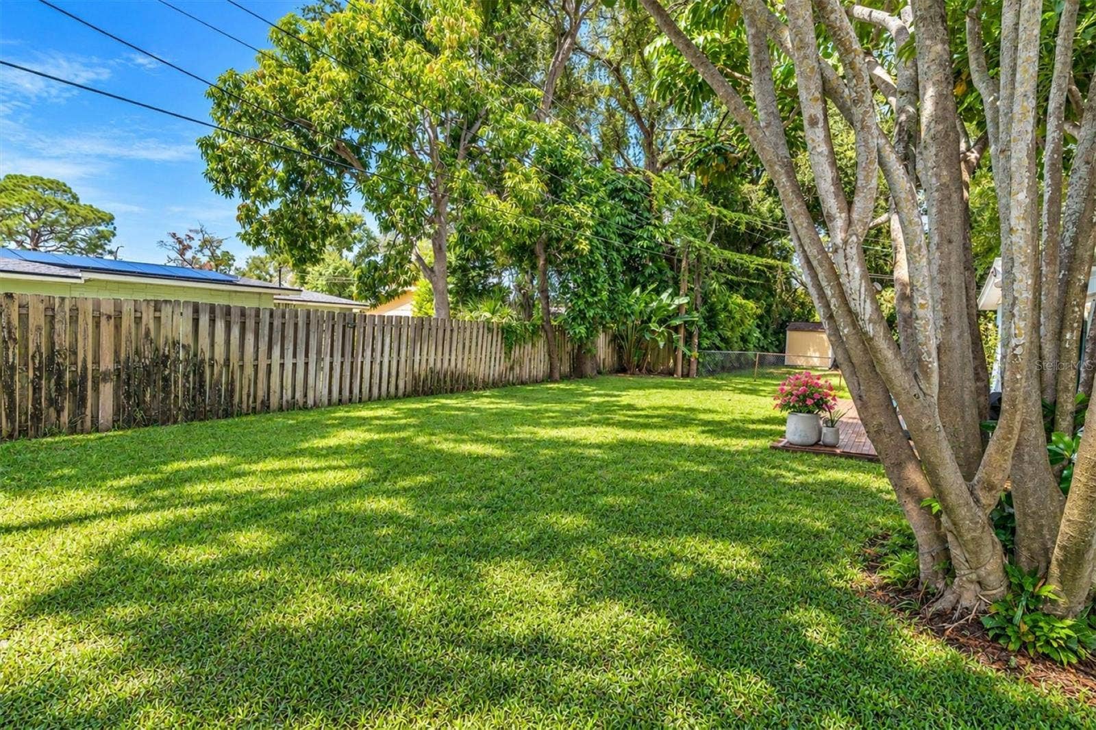 5701 6TH WAY S, St Petersburg, FL 33705 Mature greenery adds a leafy setting