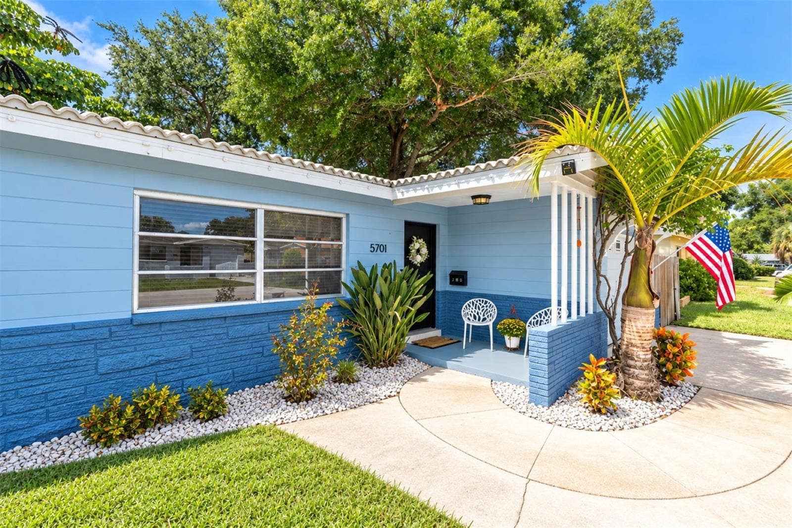 5701 6TH WAY S, St Petersburg, FL 33705 Welcoming front porch to this ranch style home and timeless Florida curb appeal