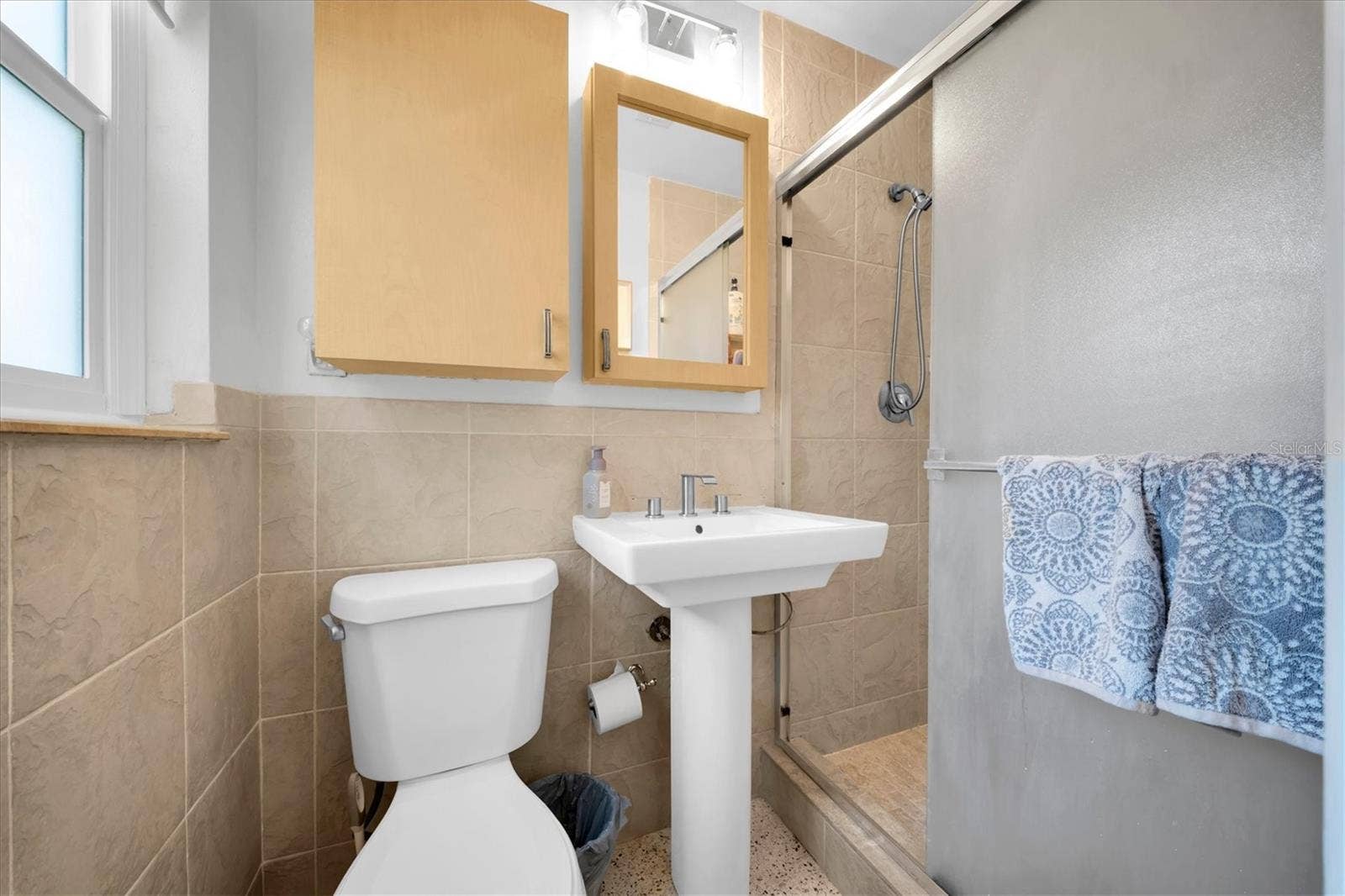 5701 6TH WAY S, St Petersburg, FL 33705 Ensuite bath with updated finishes and walk-in shower