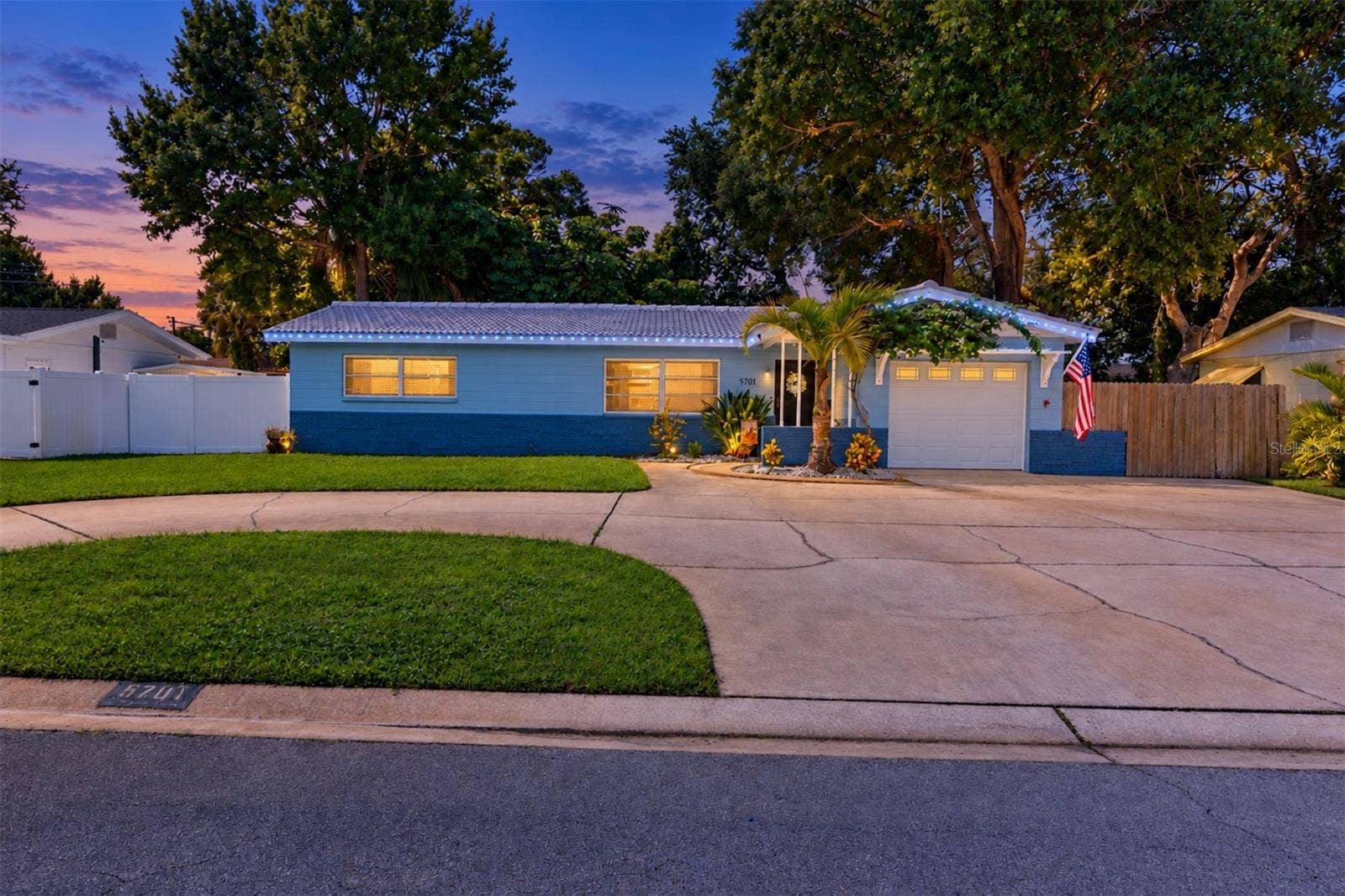 5701 6TH WAY S, St Petersburg, FL 33705 Year-Round Customizable Exterior Lighting! Permanently installed lights beneath the gutters let you change colors for every season and occasionred and green for Christmas, orange for fall, red, white and blue for patriotic holidays, or elegant white lighting for evening entertaining.