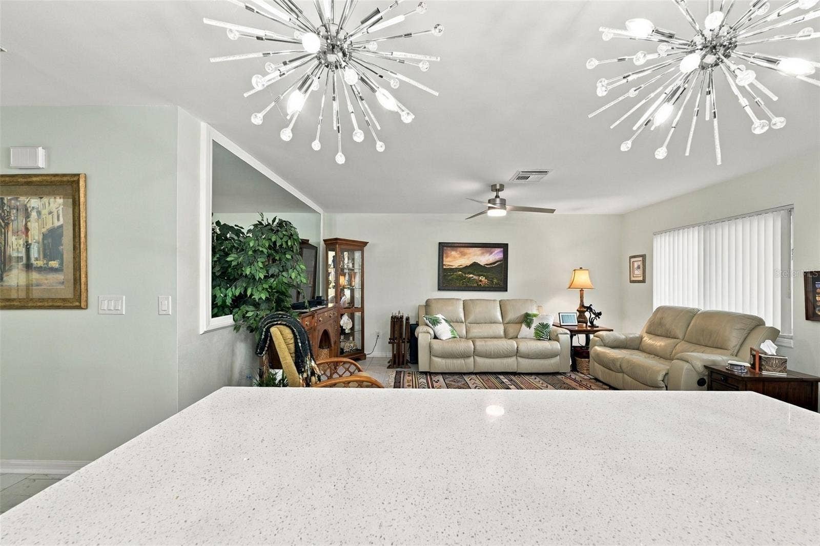 202 GLOUCESTER BOULEVARD, #357, Sun City Center, FL 33573 Looking out of kitchen into Great Room
