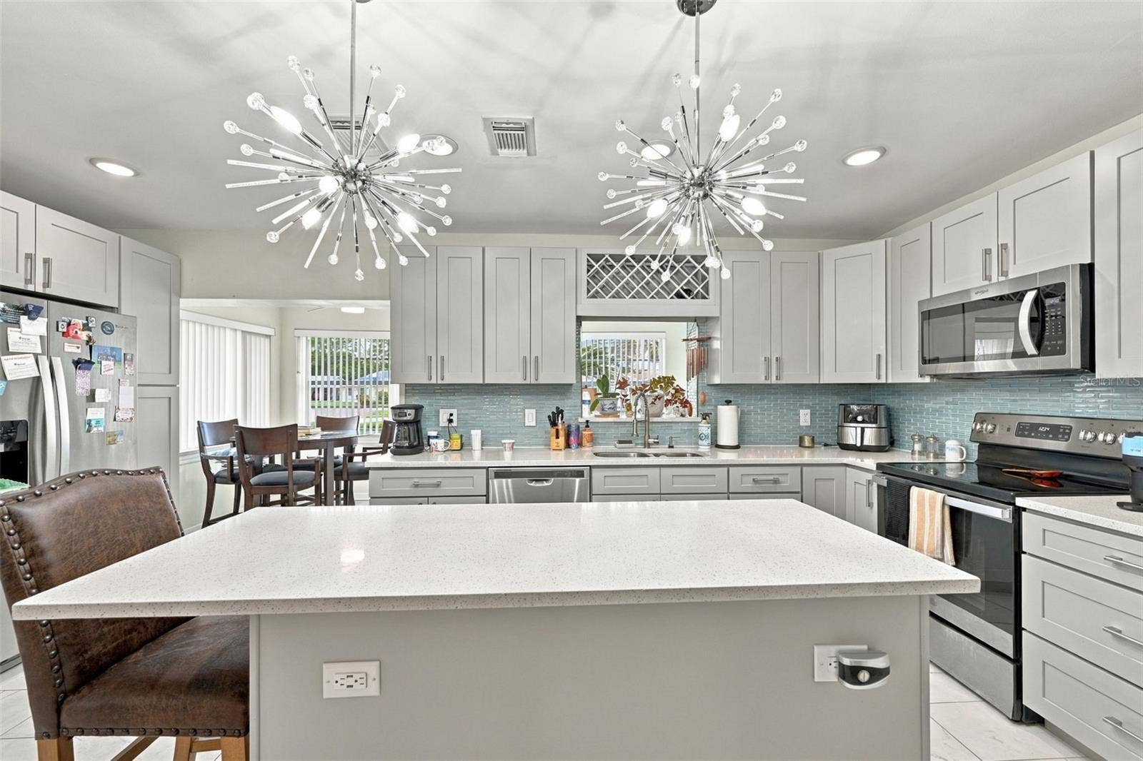 202 GLOUCESTER BOULEVARD, #357, Sun City Center, FL 33573 Looking into the Kitchen