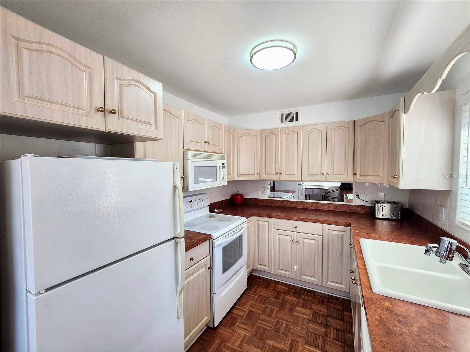 11201 80TH AVENUE, #201, Seminole, FL 33772 Ample cabinets, light & bright!