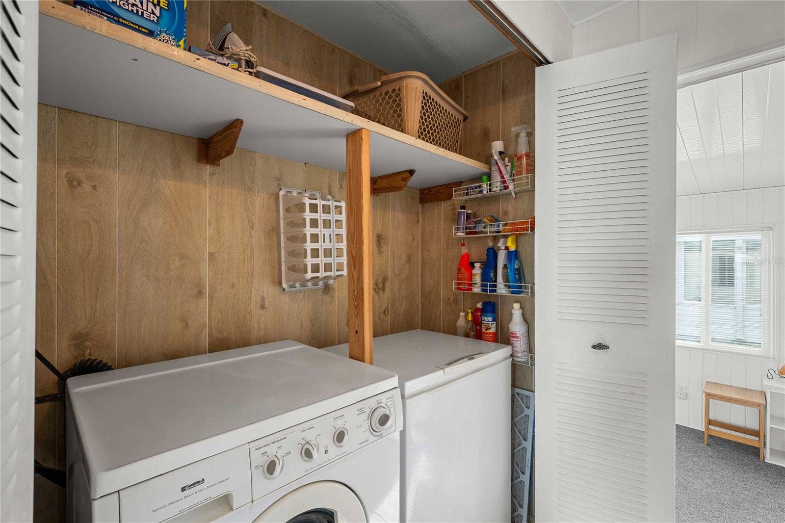 5352 PLANT STREET, Zephyrhills, FL 33542 Inside laundry area.