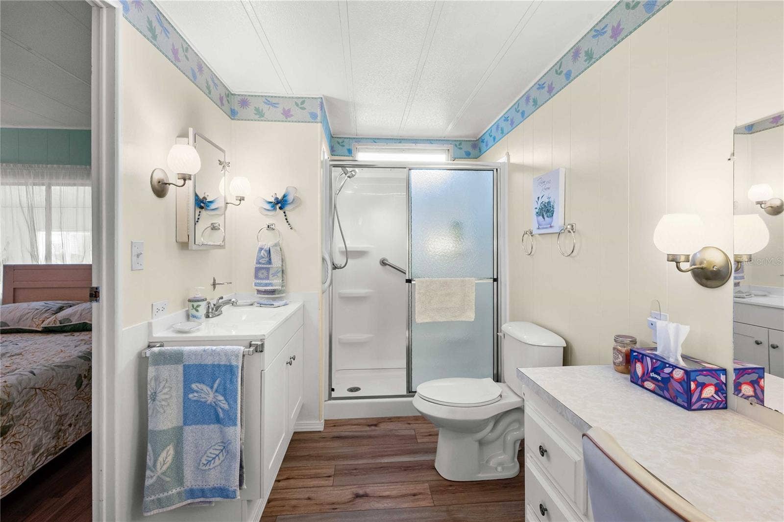 5352 PLANT STREET, Zephyrhills, FL 33542 Guest bath has step-in shower.